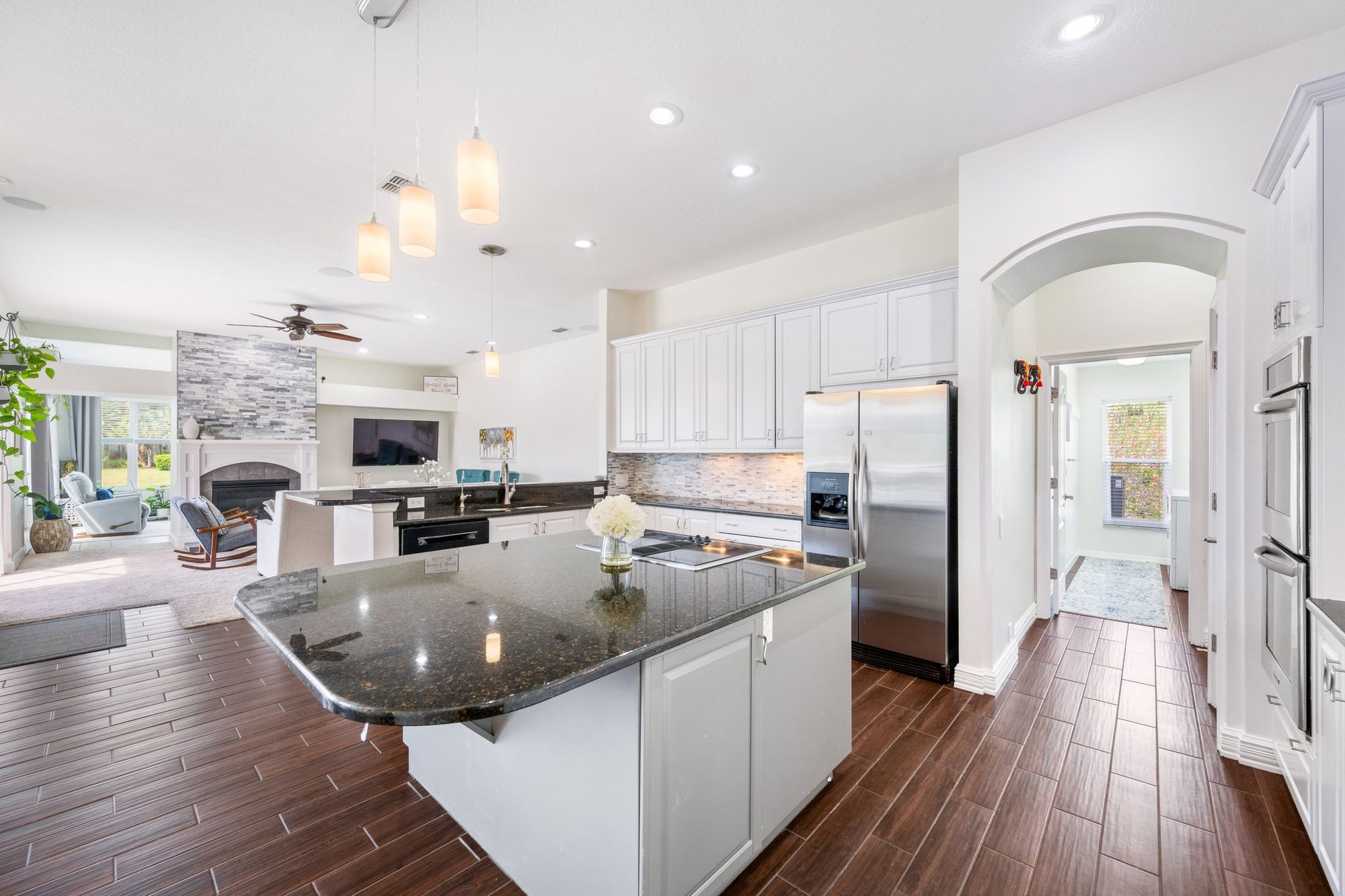 Kitchen island opening to the living room